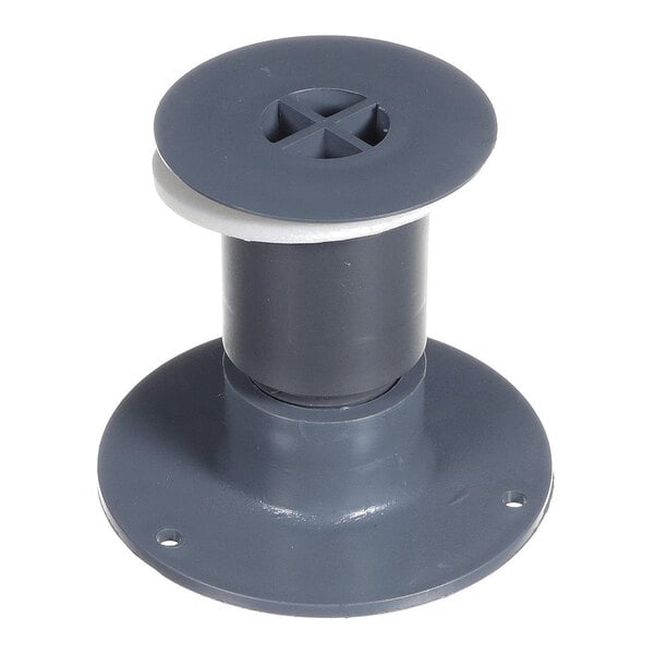 A gray plastic drain fitting with a round base featuring three screw holes and a cylindrical center section.