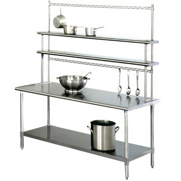 A stainless steel Eagle Group work table with Flex-Master overshelf and pot racks.