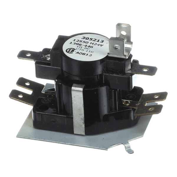 A black and metallic electrical component with multiple flat metal terminals and a label on top, mounted on a metal base plate.