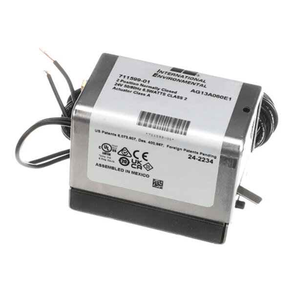 A rectangular metal electrical actuator with attached wires and a label displaying technical specifications and certification symbols.