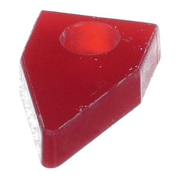 A red, triangular plastic piece with a circular indentation on top.
