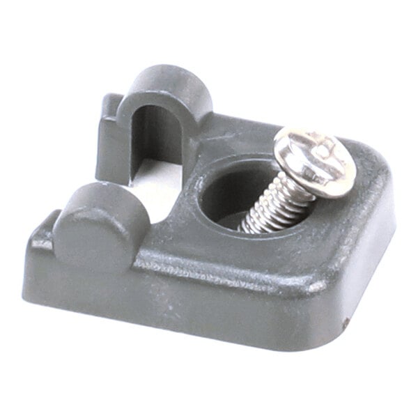 A small, square, dark-colored plastic component with a metal screw and spring, featuring a curved slot and raised edges.