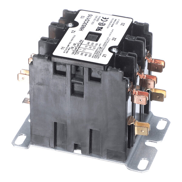 A black electrical contactor with multiple copper terminals and a white label on top, mounted on a metal base plate.