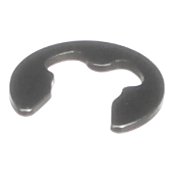 A close-up view of a small, dark, semi-circular metal ring with an open gap and notched inner edges.