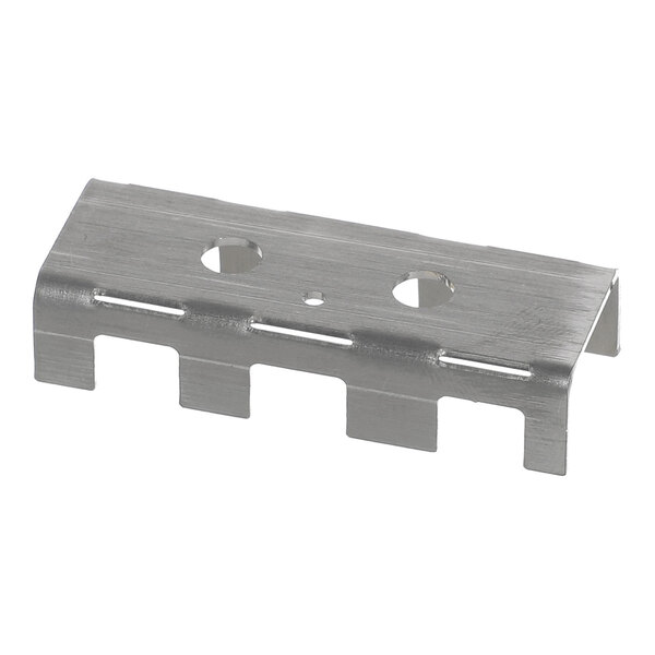 A metal clamp with a rectangular shape, featuring two large circular holes, one small circular hole, and several rectangular cutouts along the bottom edge.
