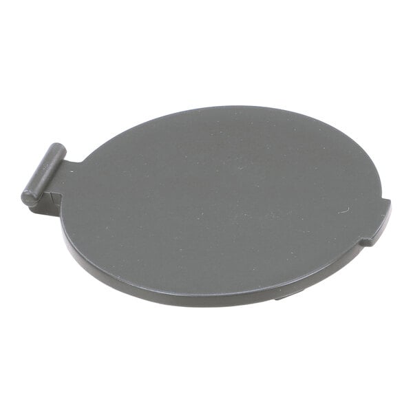 A round, flat, dark-colored plastic cover with a small hinge on one side.