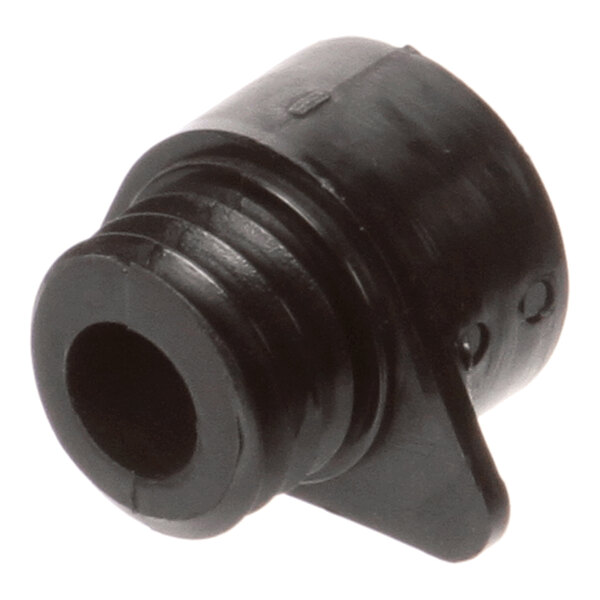 A black cylindrical plastic component with a central hole and a protruding tab, likely a bearing or bushing.