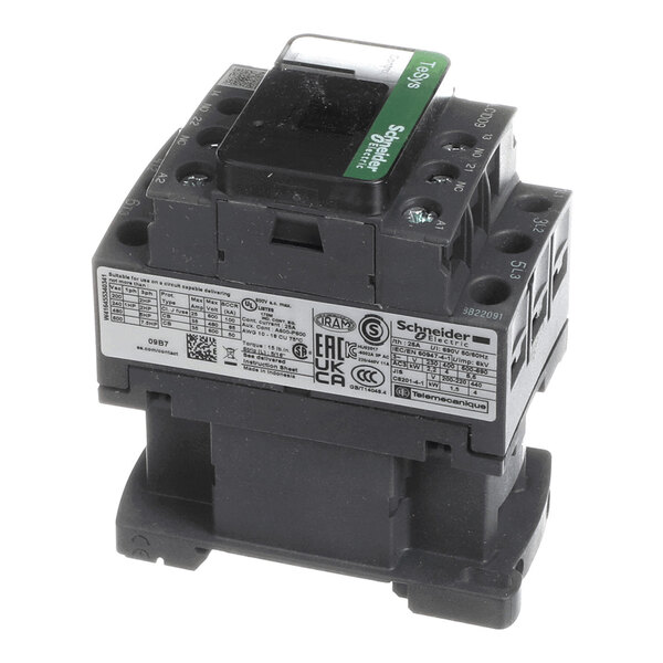 A black and gray electrical contactor with a labeled sticker and visible terminal connections.