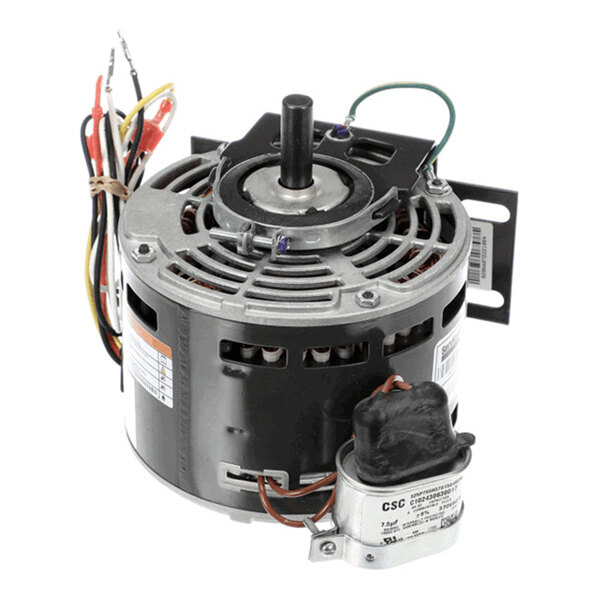 A cylindrical electric motor with a central shaft, multiple colored wires, and a mounted capacitor attached to its side.
