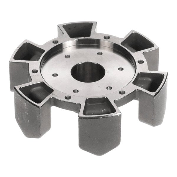 A metallic, six-spoked, circular mechanical component with a central hole and multiple smaller holes arranged in a ring.