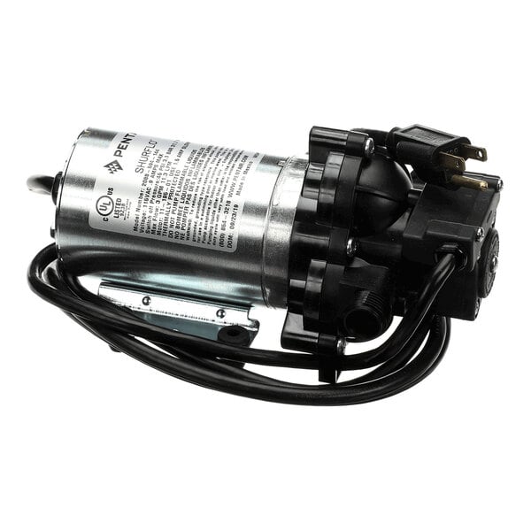A compact electric pump with a cylindrical metal body, black plastic components, attached power cord, and a standard plug.