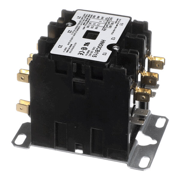 A black electrical contactor with multiple brass terminals and a white label on top, mounted on a metal base.