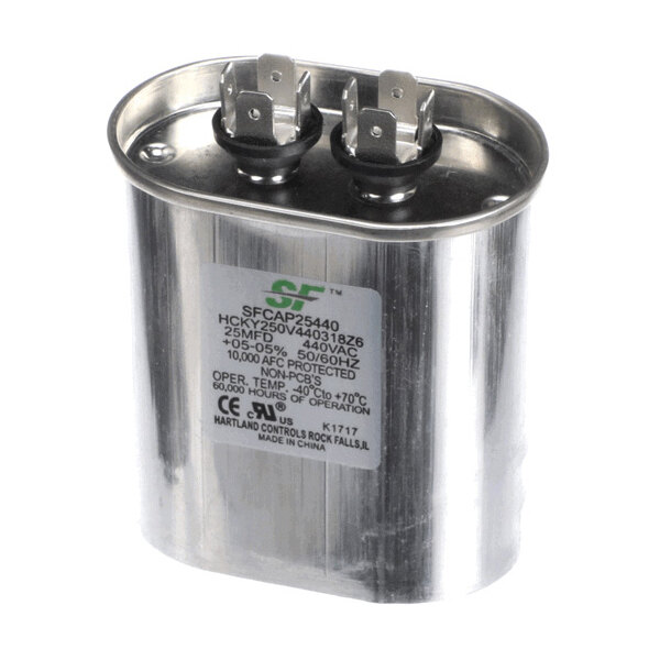 A metallic oval-shaped capacitor with two sets of electrical terminals on top and a label displaying technical specifications on the front.