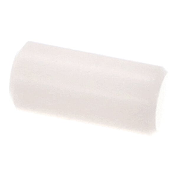 A white, cylindrical object with a smooth surface, likely made of plastic or rubber.