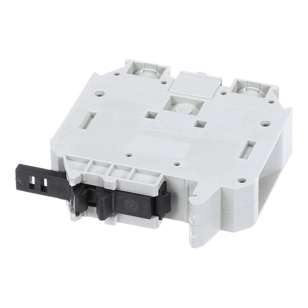 A grey rectangular plastic component with multiple slots and a black lever on one side, likely an electrical terminal block.