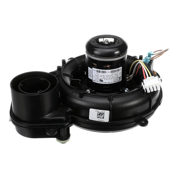 A black mechanical component with a cylindrical motor, wiring, and a round housing, likely part of an HVAC system.