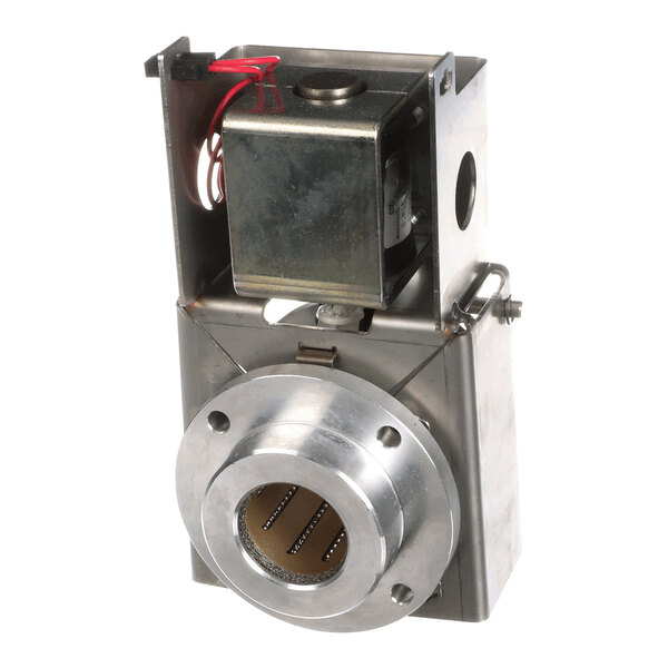 A metallic mechanical component with a cylindrical opening, visible wiring, and a box-like structure, likely part of an industrial or commercial machine.