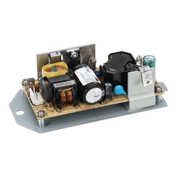 An electronic circuit board with various components including capacitors, coils, and connectors mounted on a metal base plate.