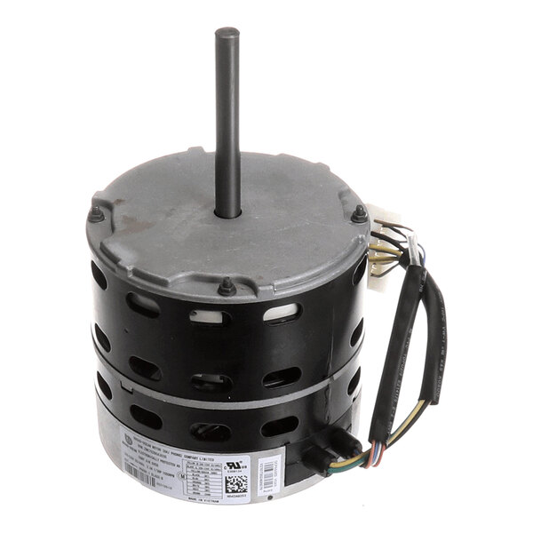 A cylindrical electric motor with a central shaft and several attached wires.