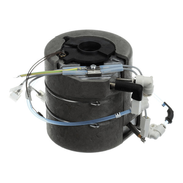 A cylindrical metallic component with attached wires, tubes, and connectors, likely part of an electrical or mechanical system.