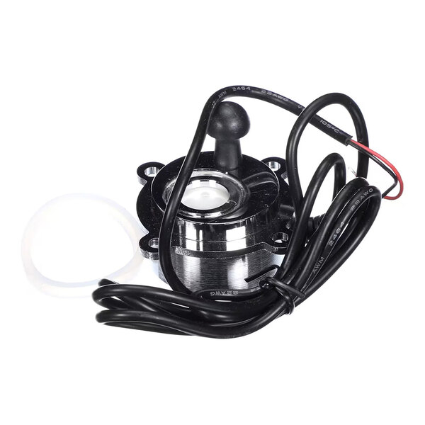 A small, cylindrical metallic device with a protruding black sensor, attached wires, and a white ring, likely an electronic sensor component.