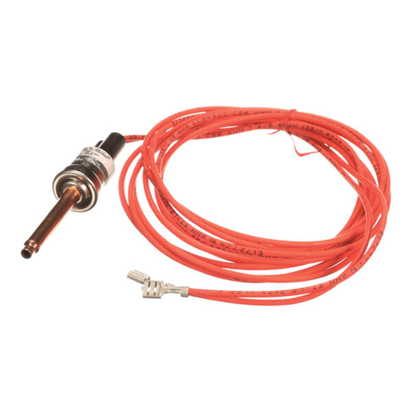 A coiled red wire attached to a cylindrical metal component with a connector at the end.