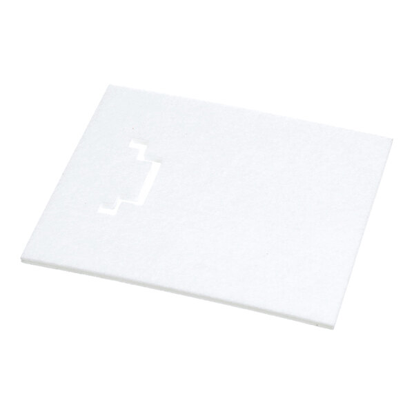 A rectangular white pad with a small cut-out section near one edge, lying flat on a white surface.