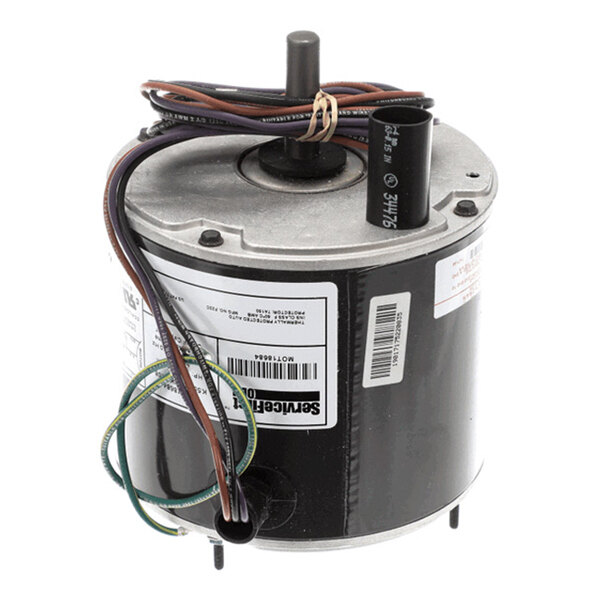 A cylindrical electric motor with attached wires and a protruding shaft, featuring labels and barcodes on its side.