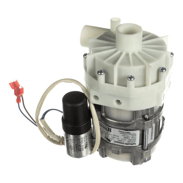 A mechanical pump assembly with a white plastic housing, metal components, attached wires, and a cylindrical capacitor.