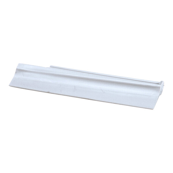 A white plastic scraper blade with a contoured edge, designed for use with a food processor or mixer.