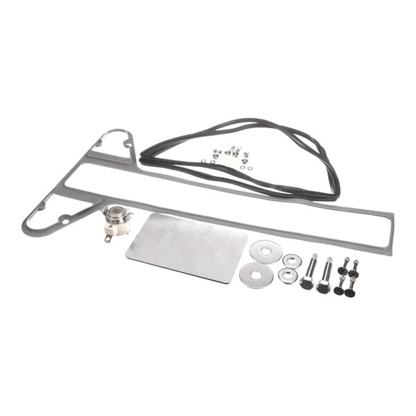 A set of various metal and rubber components, including a gasket, metal plate, bolts, washers, and a small mechanical part, arranged on a white background.