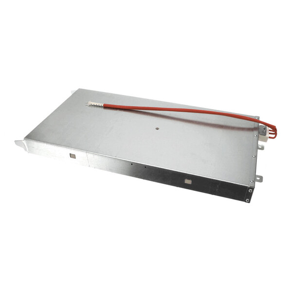 A rectangular metallic component with a red electrical wire attached, likely a heating element.