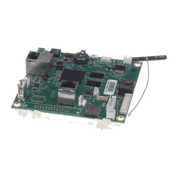 A green electronic circuit board with various components, connectors, and ports, including two large metal Ethernet ports and a black antenna wire attached.