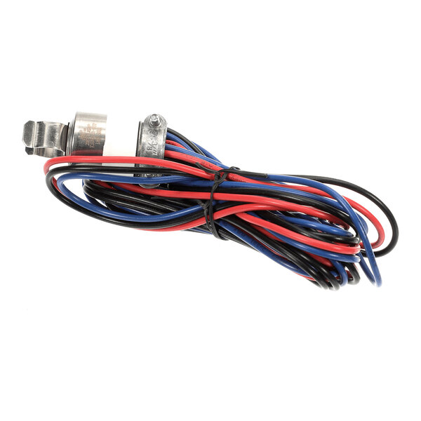 A bundle of red, blue, and black electrical wires attached to a small metal component with a clamp.