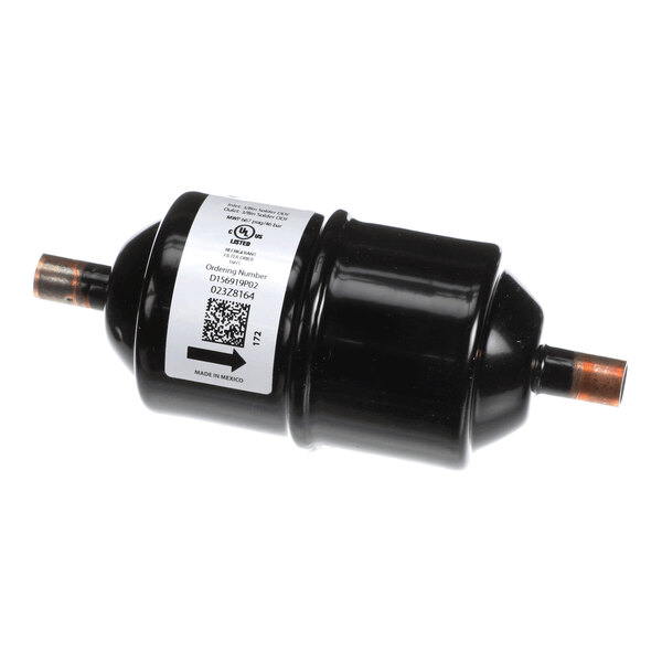 A black cylindrical component with copper pipe fittings on both ends and a white label with text and a QR code.