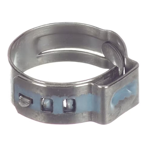 A close-up view of a metallic circular clamp with a light blue marking.