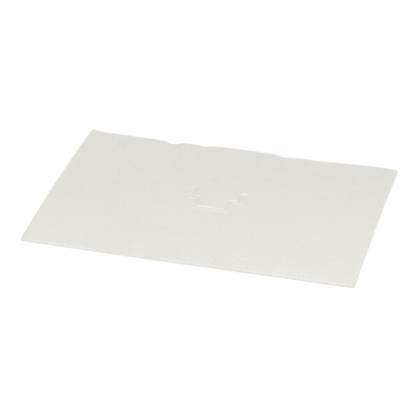 A rectangular, flat, white pad with a slightly textured surface.