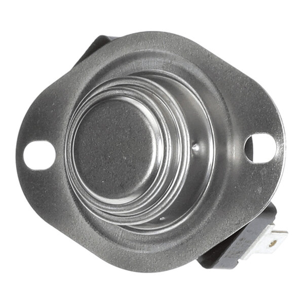 A round metallic component with two mounting holes and an electrical connector on the side.