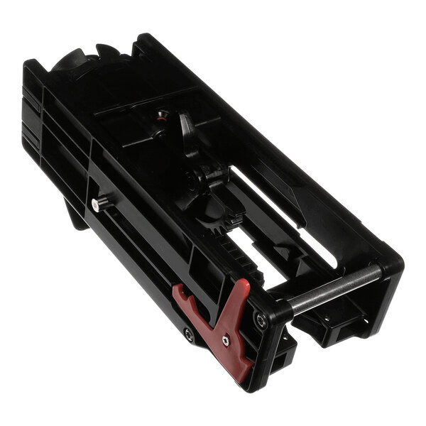 A black plastic mechanical component with a red lever and metal rod, featuring gears and slots, likely part of a larger assembly.