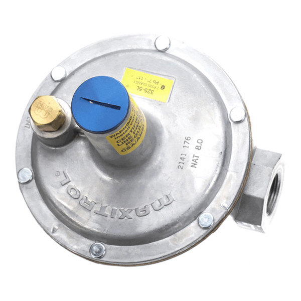 A round metallic device with a blue cap, yellow label, and side fittings, likely a pressure regulator.
