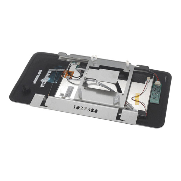 A partially disassembled electronic display unit with visible internal components, wiring, and a metal mounting frame.