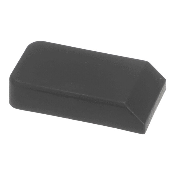 A black, rectangular, slightly angled plastic or rubber cover with rounded edges.