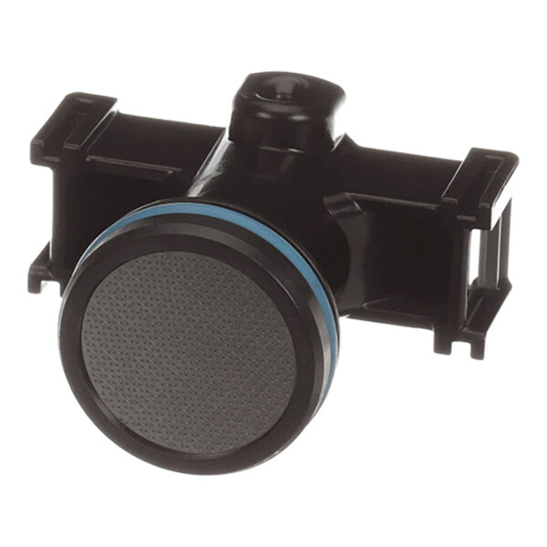 A black plastic component with a circular, textured front surface and blue ring, featuring mounting brackets on either side.