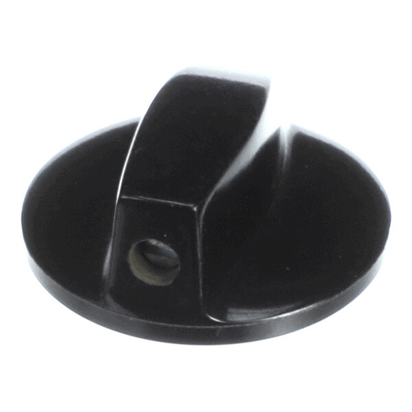 A black, round control knob with a raised grip and a visible set screw hole on the side.