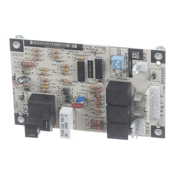 A rectangular electronic circuit board with various resistors, capacitors, integrated circuits, relays, and connectors mounted on its surface.