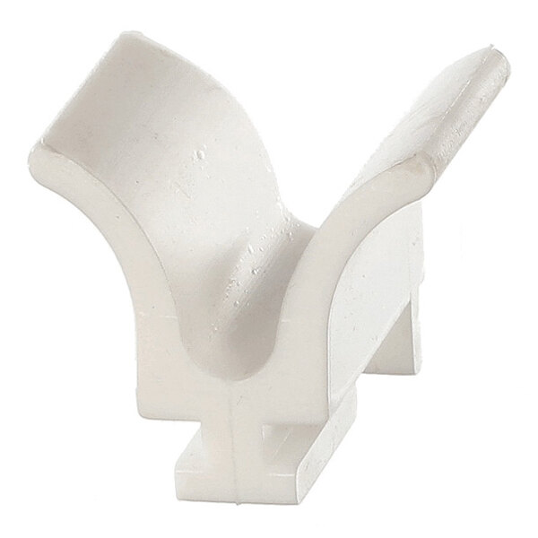 A white, curved plastic component with a V-shaped groove and a flat base.