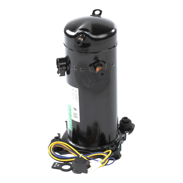 A black cylindrical mechanical component with attached wires and connectors, featuring several ports and mounting points.
