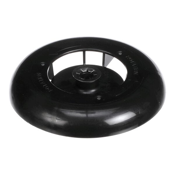 A black, circular plastic component with a central hub and open slots, resembling a fan or blower wheel.