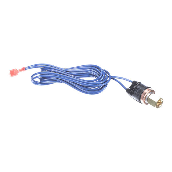 A small electronic component with a cylindrical metal body, blue wires attached, and a red connector at the end.