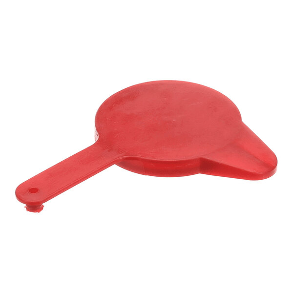 A red, flat, round plastic cap with a handle and a small protruding tab.